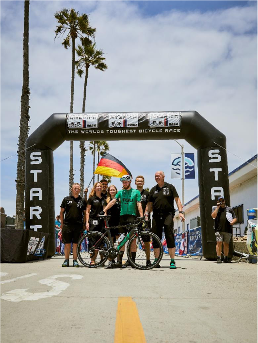 Fritz Geers at the start of the Race Across America. Fritz Geers at the start of the Race Across America, with his team and the German flag.