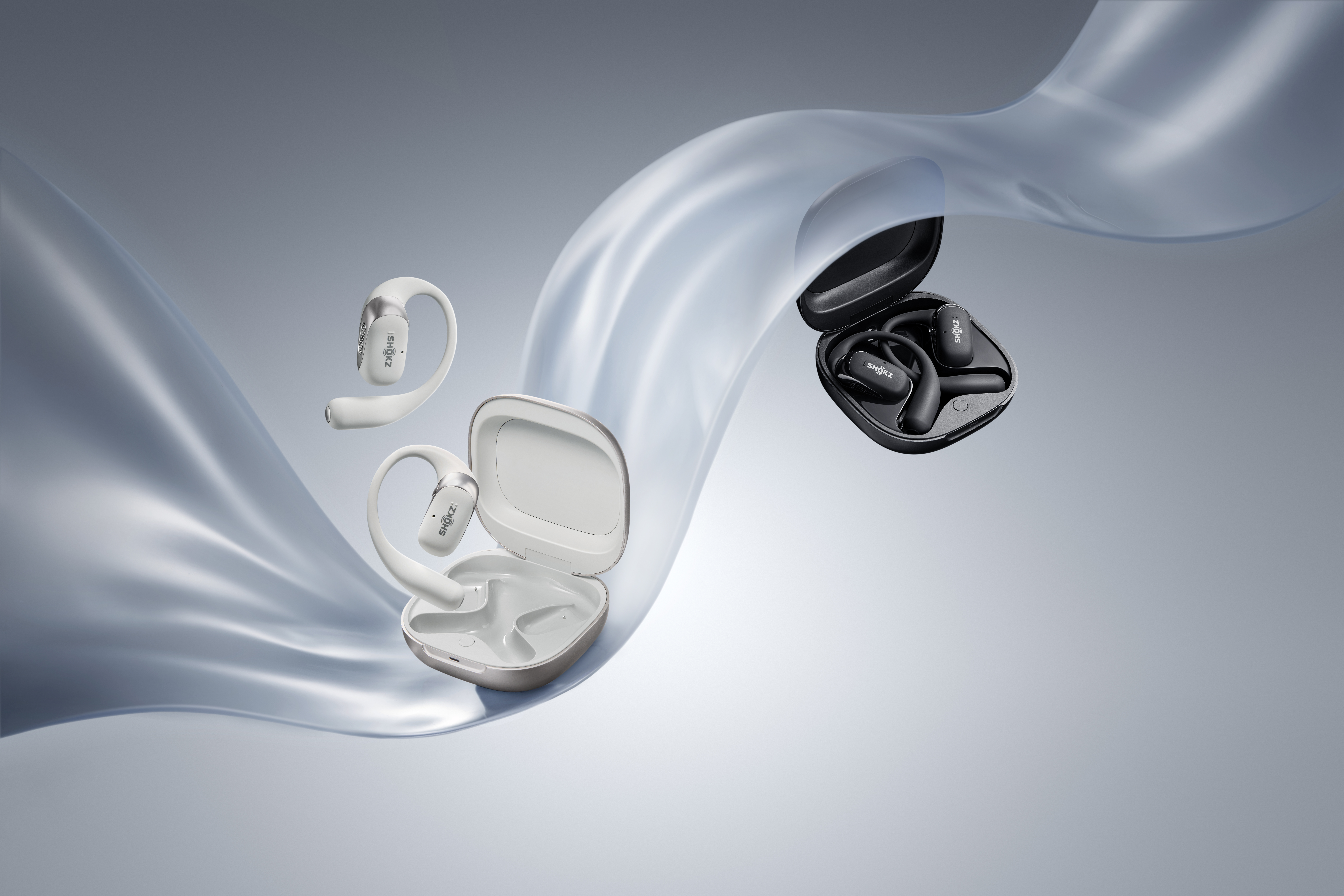 Shokz OpenFit 2 kabellose In-Ear-Kopfhörer_Ladecase in Weiß und Schwarz.