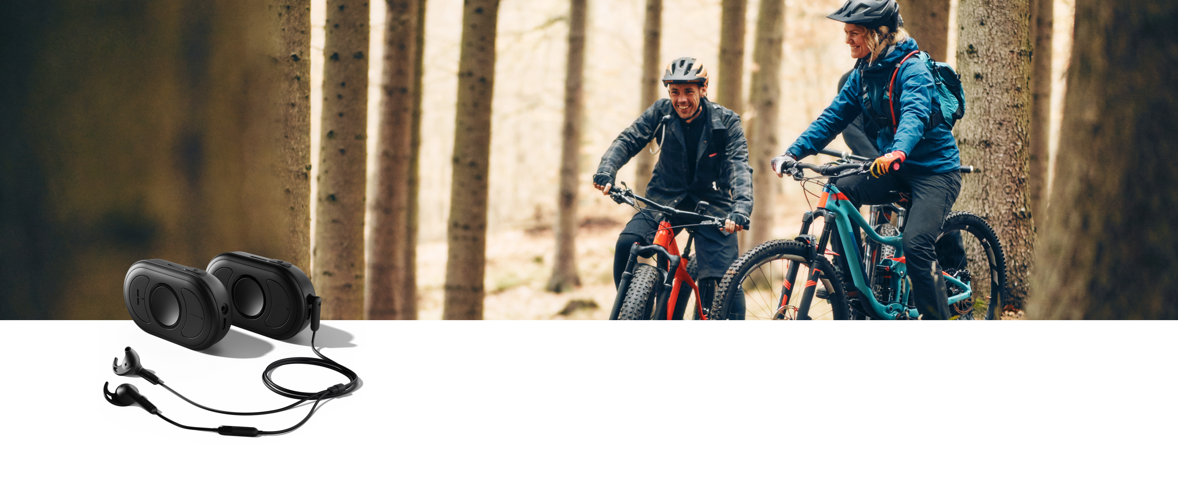 Two people in the forest on mountain bikes_in the foreground 2 black CEECOACH PLUS  A woman and a man in the forest on mountain bikes_in the foreground 2 black CEECOACH PLUS devices