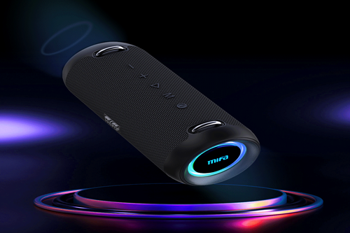 Mifa A90 speaker, floating at an angle above a shiny, round surface. The speaker has control buttons on the top and an illuminated Mifa logo on the front.